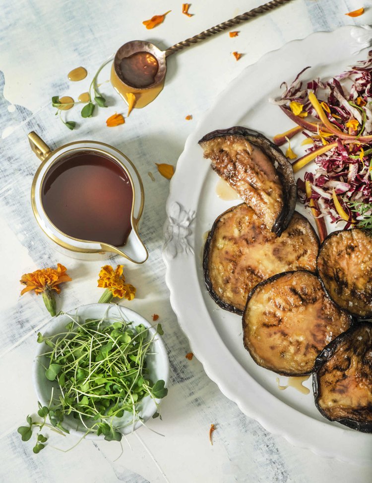 A mouthwatering plate of sweet fried eggplants, a delicious dish traditionally enjoyed during Hannukah celebrations.
