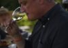 Lake Erie Wines Competing on the International Stage Man drinking Lake Erie wines