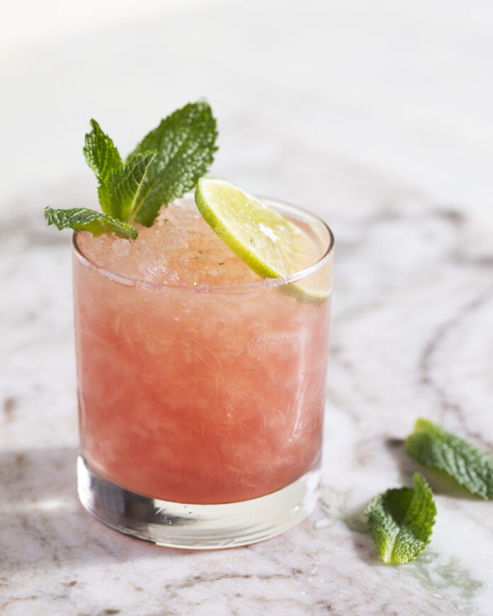 Kingfly Julep Pink liquid makes up this cocktail, a lighter, brighter, super refreshing version of a mint julep.