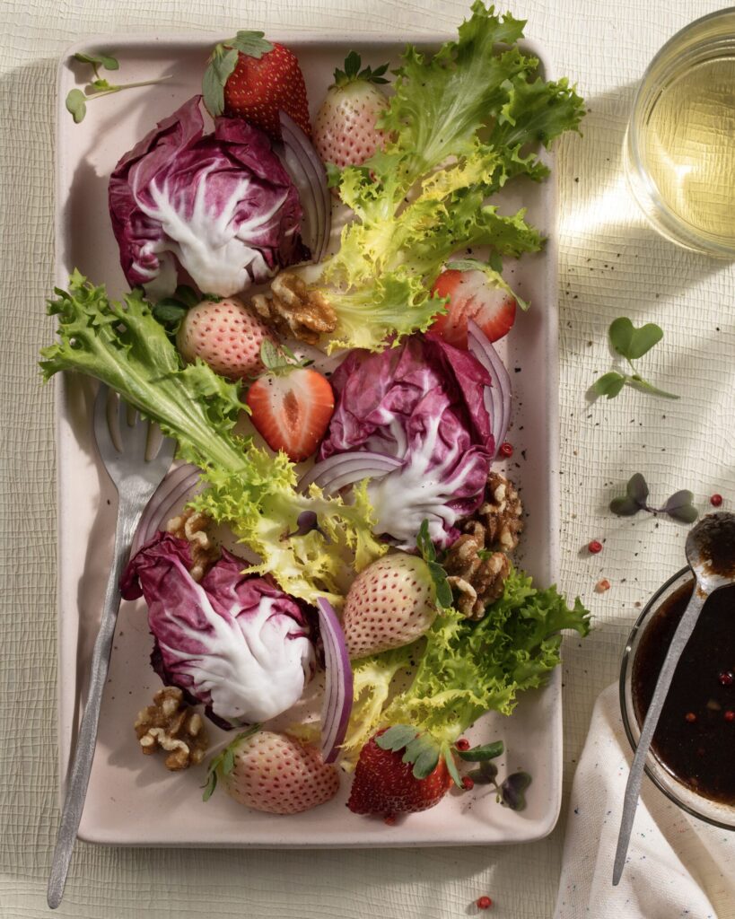 A strawberry salad with rhubarb in it.