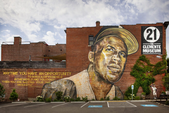 An image of the Roberto Clemente mural on the side of the Clemente Museum.