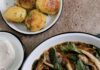 Three Pittsburgh Restaurants Are 2025 James Beard Award Semifinalists A bowl of Rwaki potato dumplings with dill and mushrooms soup in a white bowl on a table with a side bowl of roasted potatoes