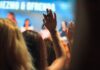 Feed the Mind with a Lecture at One of These 10 Pittsburgh Institutions A women raises her hand whole holding a pen during a lecture. Enjoy a lecture at a Pittsburgh institutions.