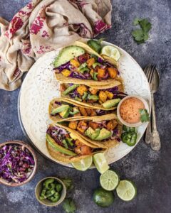 Squash Tacos sitting on a white plate