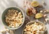 Summer Kids Movie Snack Pairings Three bowls of chili-lime popcorn sit on a white table.