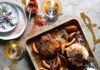 Simple Pork Chops and Peaches A delicious summer dish with seasoned pork chops and peaches, roasted together on a baking sheet.