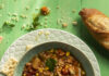 Alphabet Soup very simple, healthy, and nutritious Alphabet Soup in a light green bowl. on the right sit sits a loaf of crusty bread and saltines. Alphabet Soup Recipe