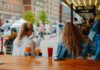 Recent Additions to The Terminal in the Strip District Two people enjoy drinks outside at a table in The Terminal.