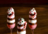 Peppermint Desserts for Festive Holiday Celebrations Three champagne flutes filled with peppermint desserts, pink, white, and brown stripes in color.
