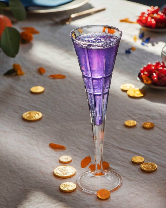 A festive and refreshing cocktail to celebrate Hanukkah, featuring a harmonious blend of flavors and spirits.