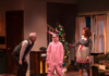 Last Minute Tickets in Pittsburgh: December 11-17 A boy dressed as Ralphie stands in a pink bunny suit in between his mom and dad on stage in Pittsburgh.