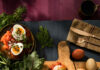 6 Root Vegetable Recipes An aerial view of a wooden cutting board filled with various veggies like carrots and beets. Carrot and Beet Latkes recipe