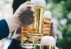 2024 Pittsburgh Saint Patrick’s Day Bar Crawls Four friends hold up full beer glasses and cheer. Saint Patrick's Day Bar Crawls in Pittsburgh