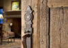 Allegheny Millwork & Lumber Provides Choice Architectural Products A wooden door with an ornate metal handle.