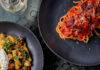 Where to Enjoy Italian Cuisine in Pittsburgh Three pasta dishes sit on a tabletop. The top left dish is an Italian red sauce pasta. The middle left dish is a lighter pasta. And the third dish in the bottom right corner is a lasagna noodle dish.