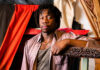 Pittsburgh Artist Steve Alexis’s Work is Emotion Manifested in Form a black man with short dreads leans against something that looks like a cat scratcher in his studio. artist Steve Alexis
