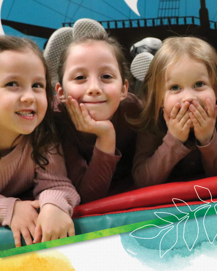 three little girls smiling, children's therapy