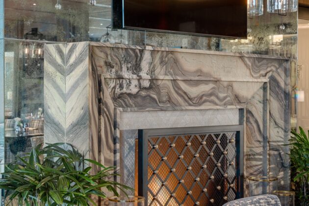 A marble fireplace by Armina Stone at Nemacolin.