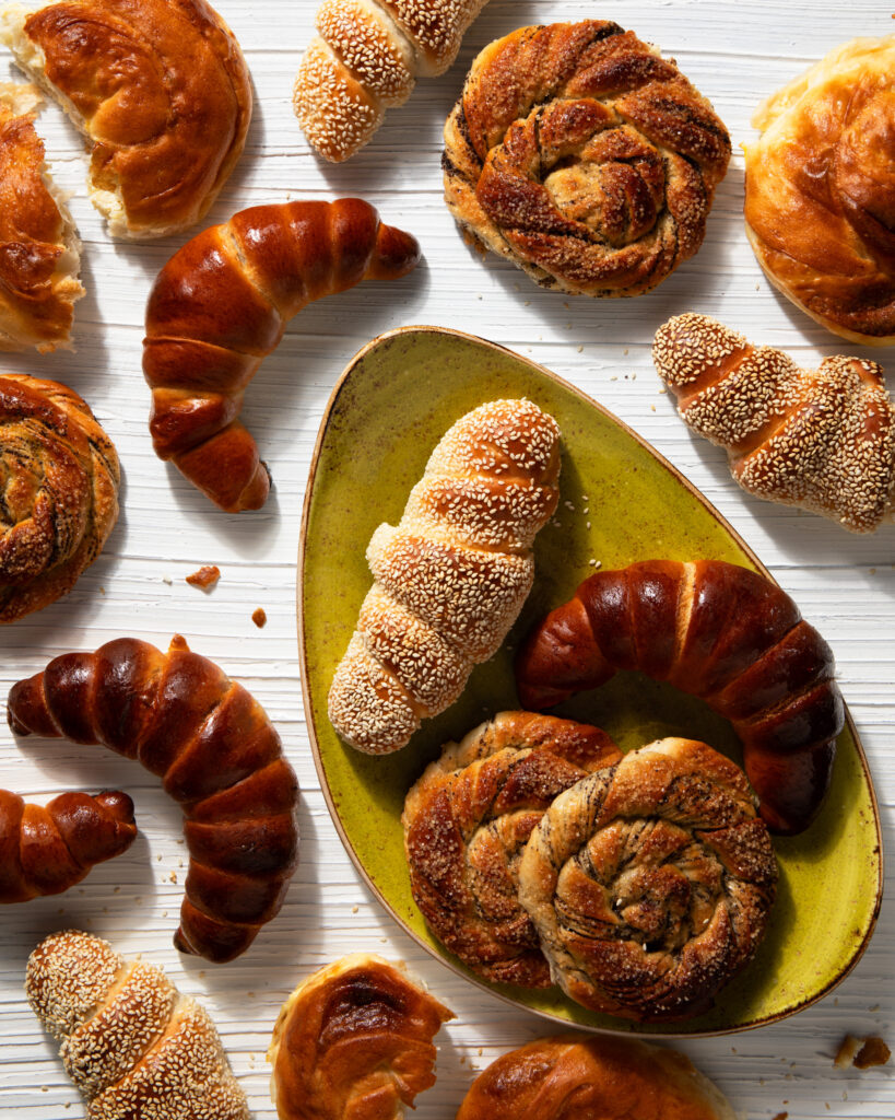 A variety of baked croissants and other baked good ready-to eat from vendors at Pittsburgh farmers' markets.