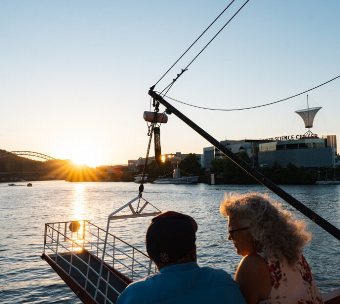 A couple enjoying Pittsburgh river activities as part of the Gateway Fleet