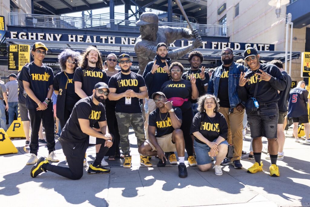 A group of 1Hood Media gather outside the Pittsburgh Pirates gates for an inclusive event.