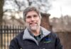 5 Pittsburgh Events for This Week (September 16-22) A man from the National Aviary in Pittsburgh stands in front of a fence outside in a jacket with binoculars in hand.
