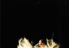 6 Events for Arts and Culture Loving Foodies This October A woman from Flamenco Pittsburgh dances on stage, throwing her dress up into the air.