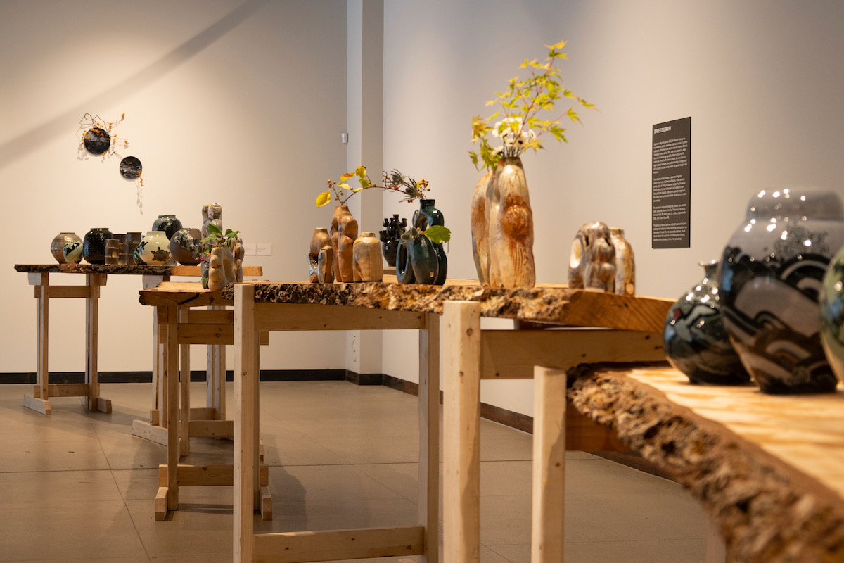 A lineup of flower arrangements in Contemporary Crafts 