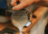 What’s Happening for Pittsburgh Coffee Week A person pours coffee into latte art