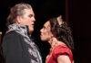 Pittsburgh Arts & Entertainment: 2024–25 Season Highlights A still from Tosca, staged at the Pittsburgh Opera--a woman in red sings in the face of a man in decadent renaissance garb