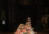 Holiday Cookie Recipes From Our Cookie Table Bake-Off A table full of holiday cookies decorated for the winter.