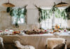Deck the Halls with Three Design Experts’ Christmas Decorating Tips The interior of Leanne Ford's home, draped with pine for Christmas