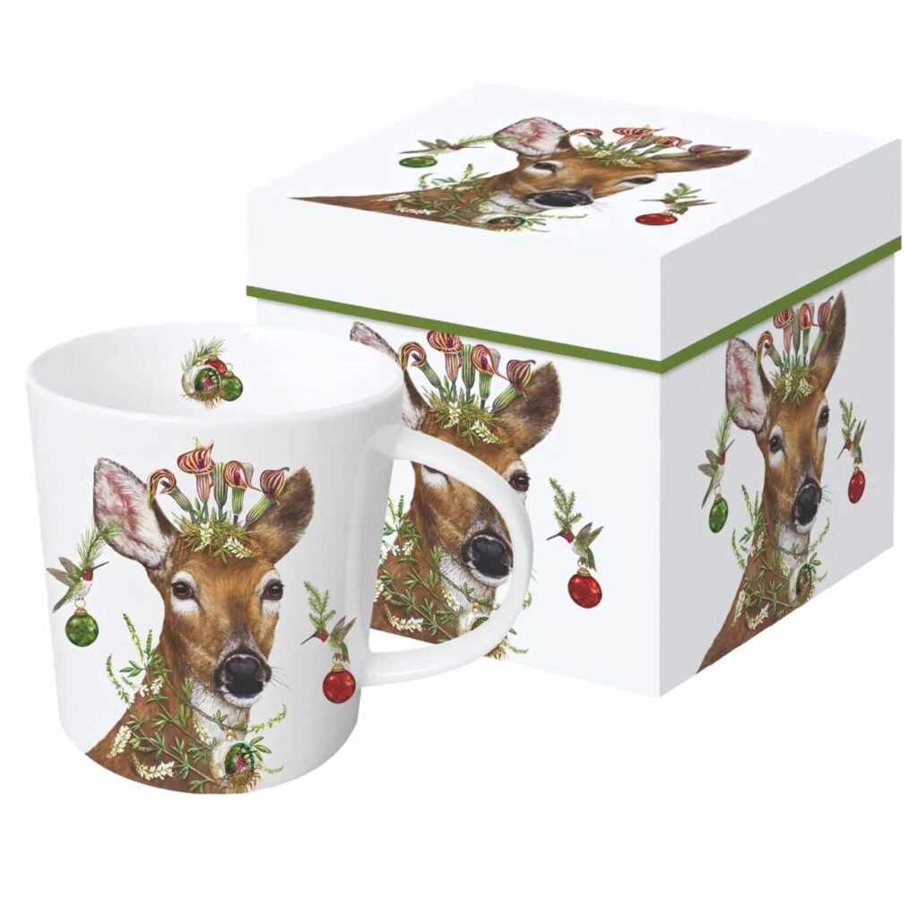 A white box and mug with a deer painting on it.