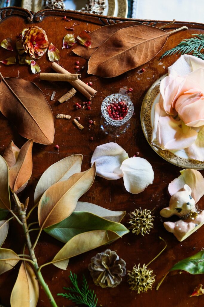 Leaves and flowers on a mahogany table in a Sewickley home