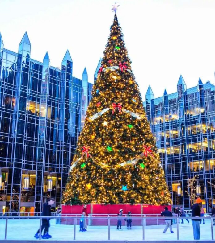 A cheerful Christmas tree lit up in Pittsburgh's PPG place