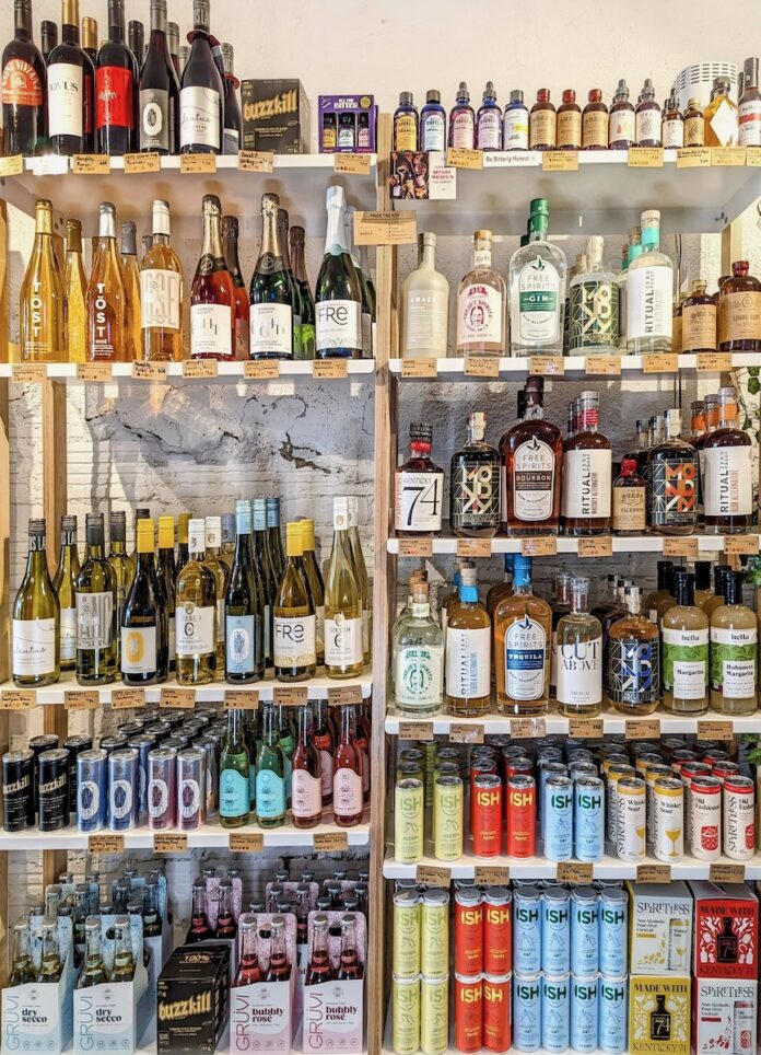A shelf of non-alcoholic spirits from The Open Road in Pittsburgh