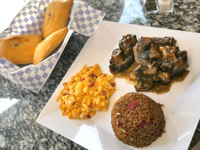 Plate of Caribbean food from Pauline's, a Pittsburgh restaurant.
