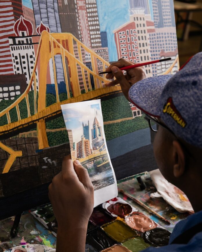 4 Pittsburgh Artists Artist Darian Johnson at work in his studio.