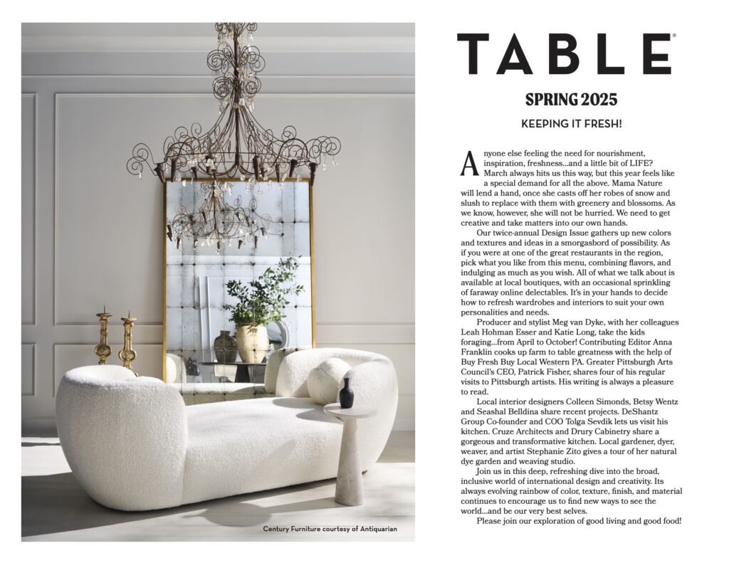A magazine layout page with a photo of a white couch on the left and TABLE magazine text on the right.
