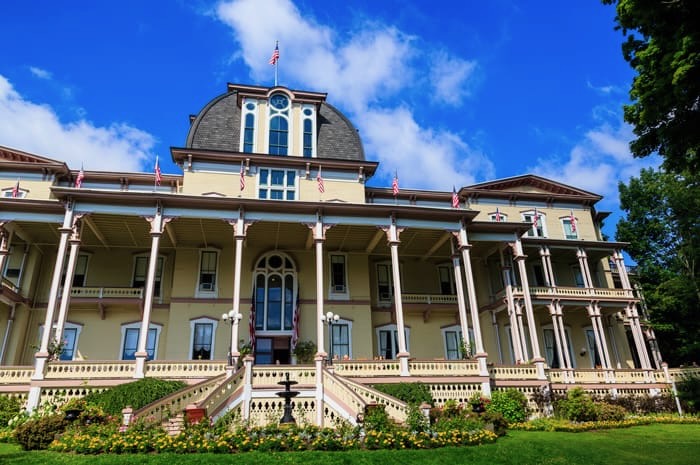 The exterior of the Chautaqua Institution on a sunny day. 