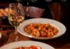 Girasole Celebrates 25 Years in Shadyside A plate of escarole and red sauce at Girasole, their signature dish.