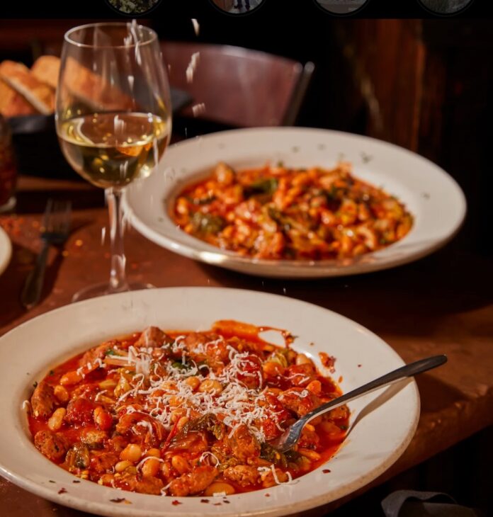 A plate of escarole and red sauce at Girasole, their signature dish.