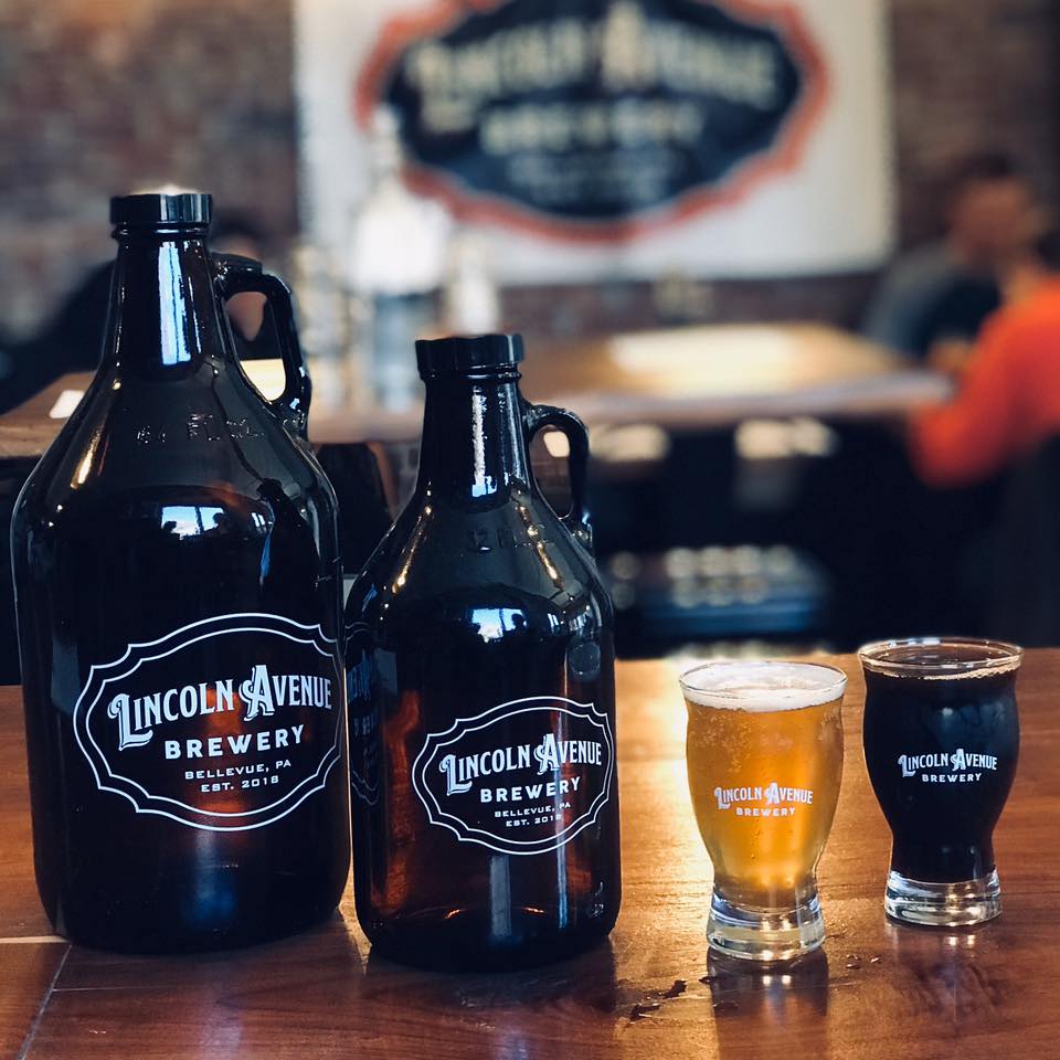 A set of two beer glasses and two bottles from Lincoln Avenue Brewery in Bellevue.