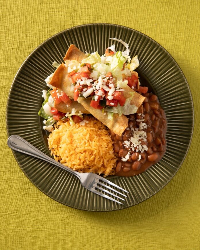Join Literacy Pittsburgh for One Big Table: An International Tasting A plate from La Palapa's in Pittsburgh that has flautas, beans, and rice which will be served at One Big Table.