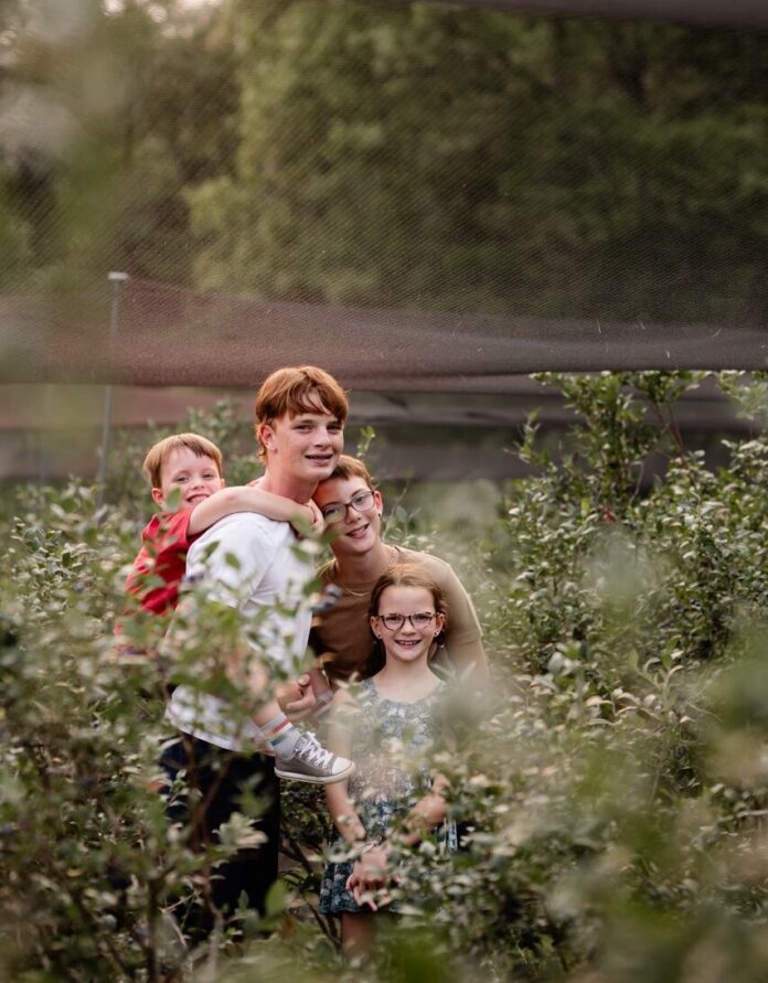 Blueberry Forage Evening/ Blueberry Dutch Baby Morning A group of siblings gather in a field for foraging blueberries from various bushes.