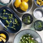 A set of plates of peas with soffritto.