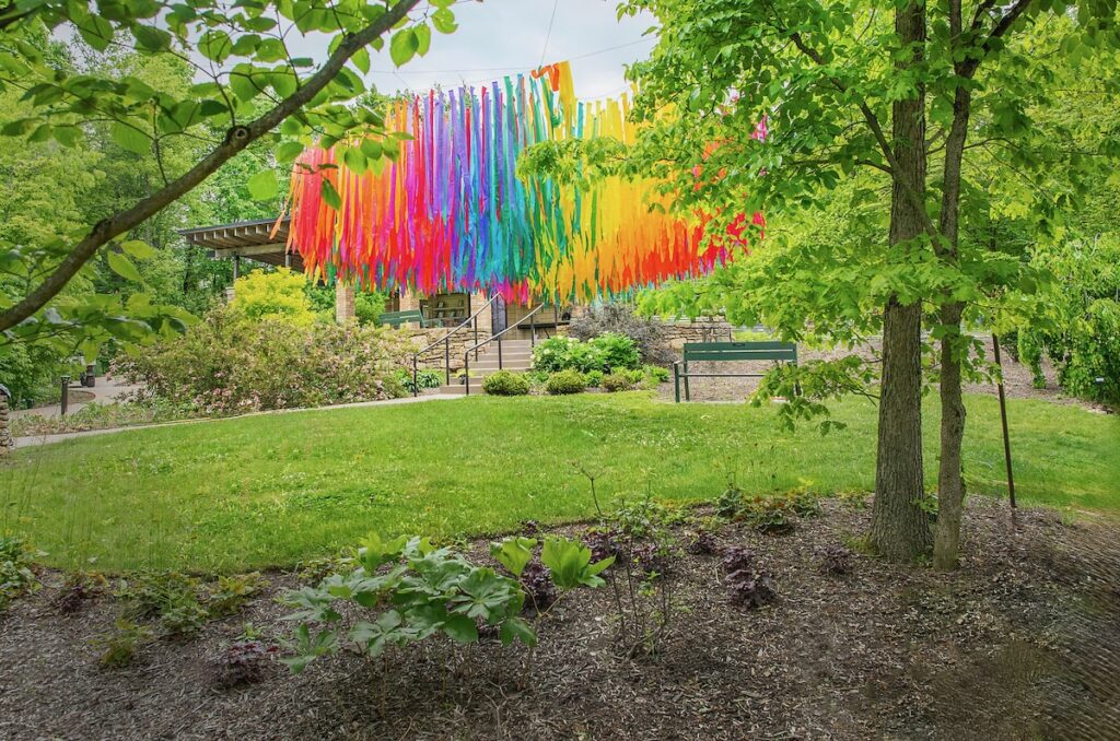 Colorful hanging streamers in the Five Senses Garden.