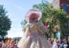 Celebrate Pride Month 2025 in Pittsburgh A drag queen dances at the Lawrenceville Pittsburgh Pride event in front of a crowd of people outside.