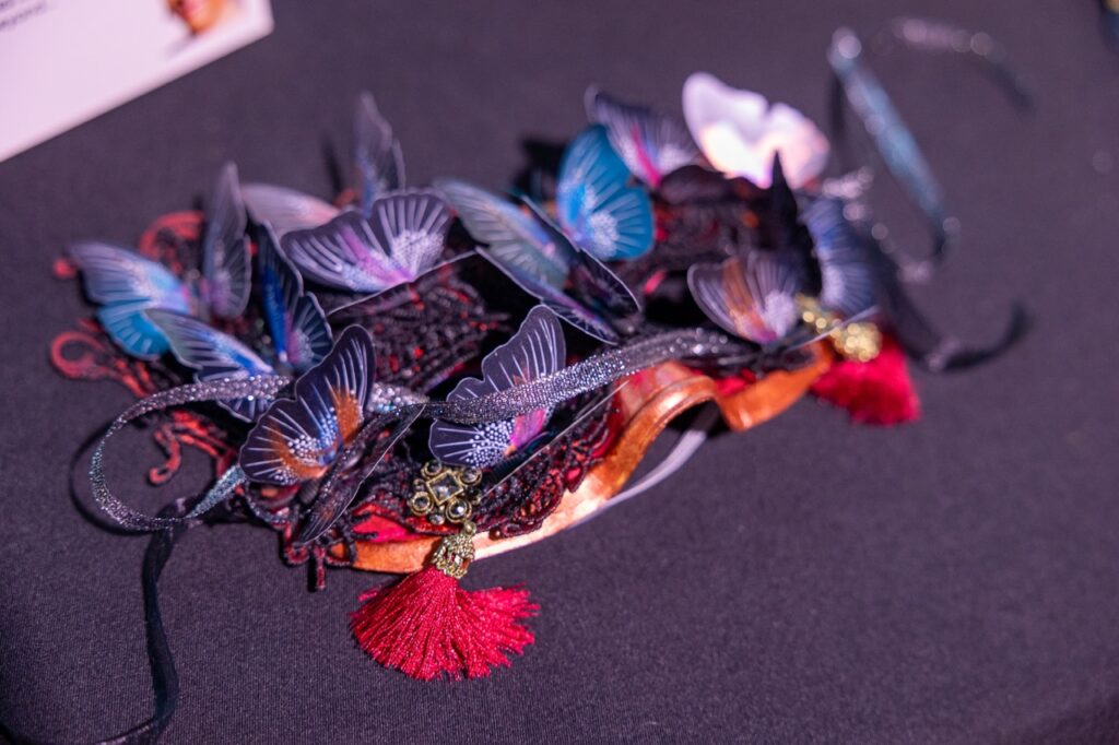 A painted butterfly masquerade mask.