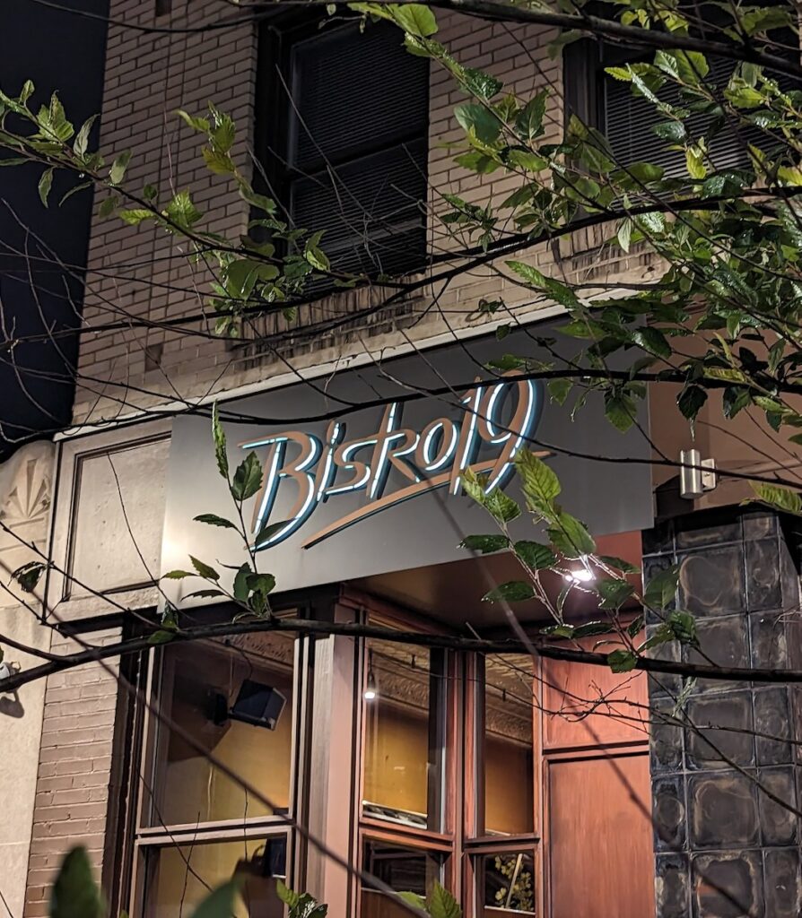 The exterior of Bistro 19 in Mt. Lebanon at night.